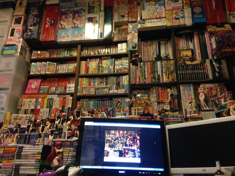 Illustration for article titled Japan's "Huge Boob Producer" Has a Desk Surrounded by Boobs